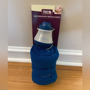 New pet dispensing brush and towel